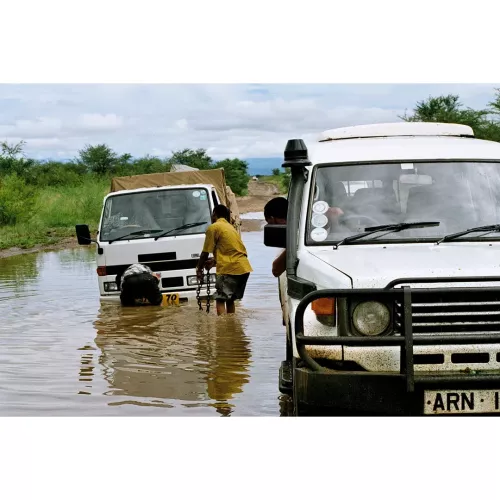 Vehicle Stuck In A Flood - Wrapped Canvas Print