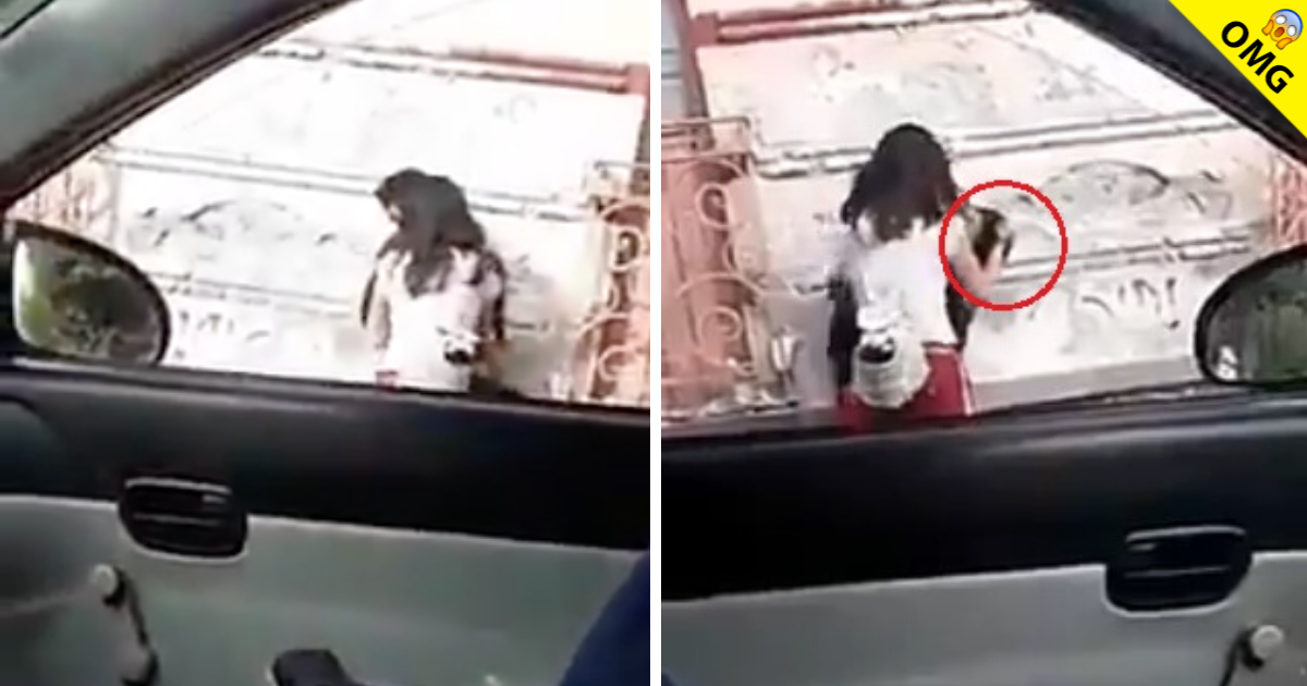 Captan a chica golpeando a su novio en la calle