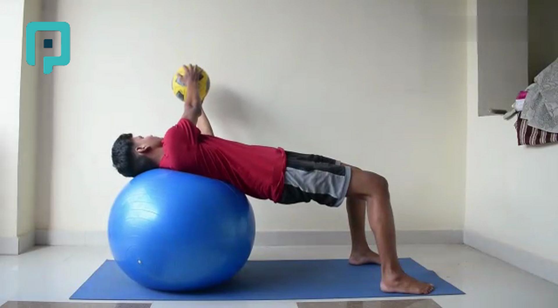bridge with trunk rotation holding medicine ball on swiss ball - beginner Trunk exercise