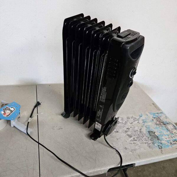 READ THE DESCRIPTION** Kismile Portable Electric Radiator Heater, Oil Filled with 3 Heat Settings, Adjustable Thermostat, Overheat & Tip-Over Protection For indoor use, 1500W (Black) | EZ Auction