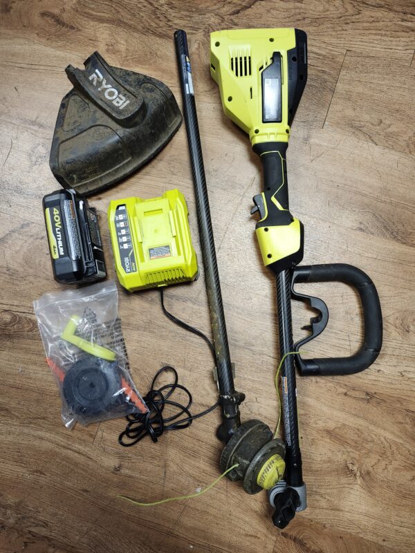 ***USED BUT IN WORKING CONDITION***RYOBI 40V 15" Carbon Fiber Shaft Expand-IT String Trimmer/Edger Kit | EZ Auction