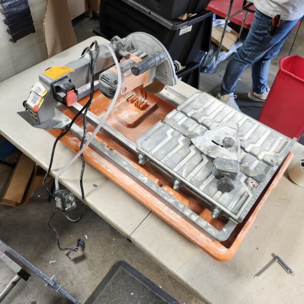 ***READ DESCRIPTION*** RIDGID 9-Amp 7 in. Blade Corded Wet Tile Saw with Stand | EZ Auction