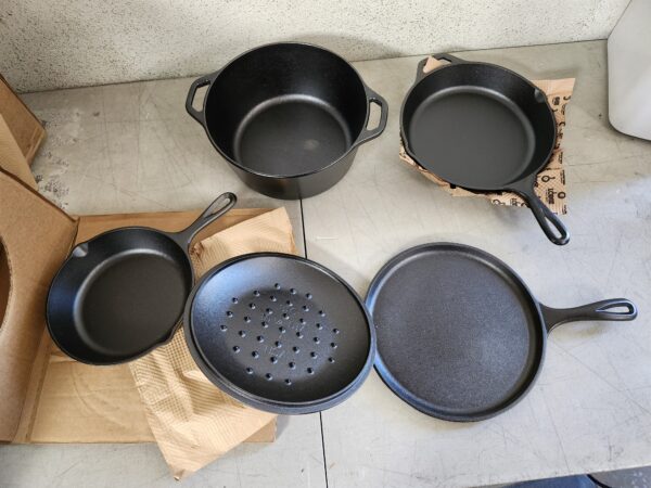 Lodge Seasoned Cast Iron 5 Piece Bundle. 10.5" Griddle, 8" Skillet, 10.25" Skillet, 10.25" Dutch Oven, and 10.25" Lid,Black | EZ Auction