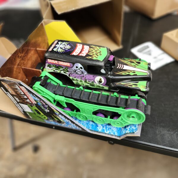 Monster Jam, Official Grave Digger Trax All-Terrain Remote Control Outdoor Vehicle, 1:15 Scale, Kids Toys for Boys and Girls Ages 4 and up | EZ Auction