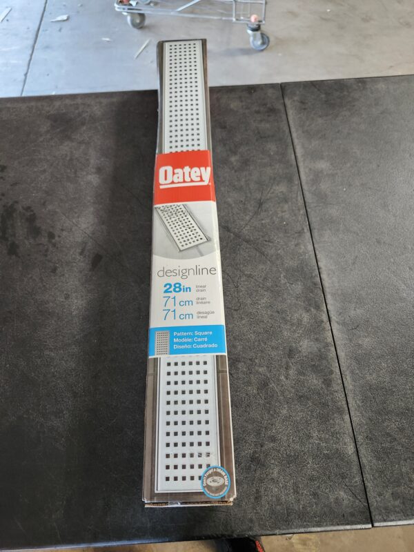 "Oatey Designline 28 in. Stainless Steel Linear Shower Drain with Square Pattern Drain Cover" | EZ Auction