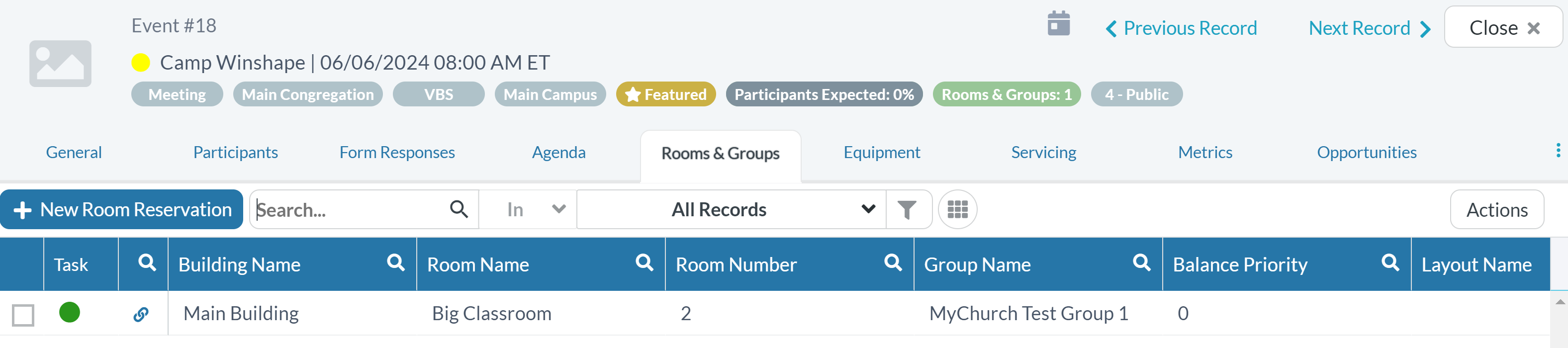 Image displaying an example event's Rooms & Groups tab.