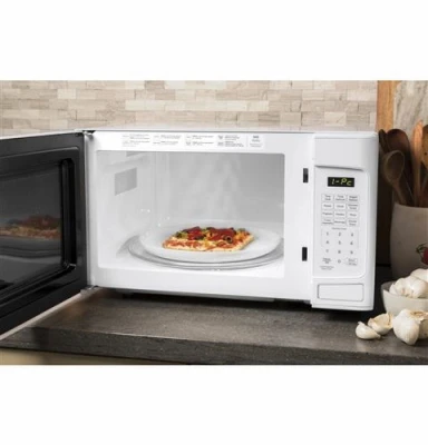 White Microwave Oven 1.1 Cubic Feet Capacity 950 Watt Power