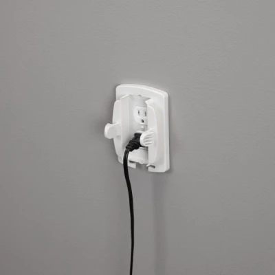 White Outlet Cover with Built-In Cord Shortener for Electrical Safety