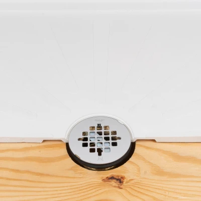 No-Caulk Shower Drain with Brass Body and Steel Strainer Cover