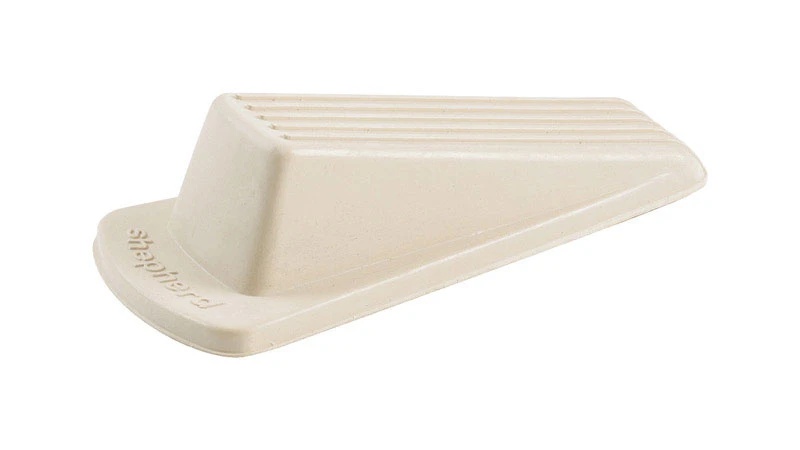 1.5 In. H X 1.25 In. W X 4.75 In. L Off White Rubber Wedge Door Stop