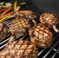 Genesis E-325 Three-Burner Liquid Propane Gas Grill with 39,000 BTU and Sear Burner in Black