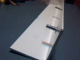 STUDDED ANGLE 2X2X24.3 STORM PANEL TRACK 6" OC