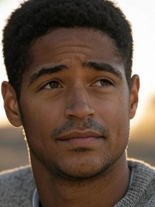 Alfred Enoch — celebrity look-alike to Oscar Nuñez