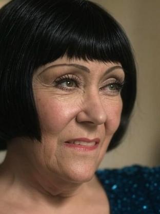 Gloria Swanson — celebrity look-alike to Claudette Colbert