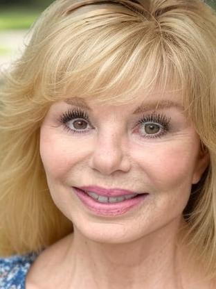Loni Anderson — celebrity look-alike to Charo