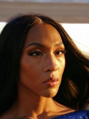 Person who looks like Trina McGee