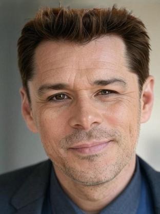 Person who looks like Mark Consuelos