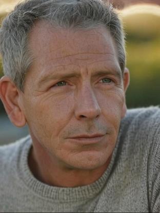 Person who looks like Greg Kinnear