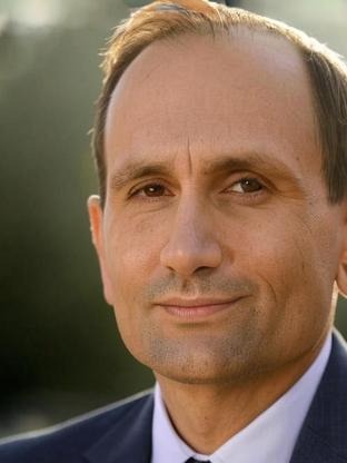 Person who looks like Mark Strong