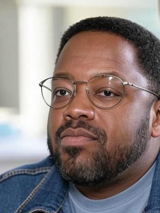 Person who looks like Ron Funches