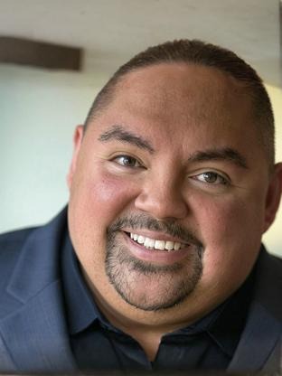 Person who looks like Guy Fieri