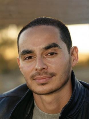 Person who looks like Shaun Toub