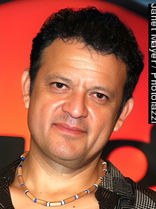 Person who looks like Raul Julia