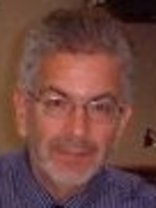 Person who looks like Tim Curry