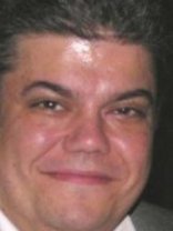 Person who looks like Harry Hamlin