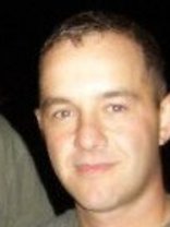 Person who looks like Tim Robbins