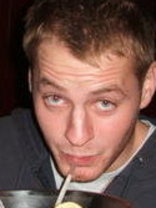 Person who looks like Tim Curry