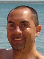 Person who looks like Tim Curry