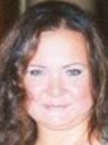 Person who looks like Heather Tom