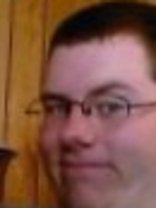 Person who looks like Drew Carey