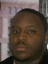 Person who looks like Doug E. Fresh