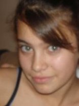 Person who looks like Mary-Kate and Ashley Olsen