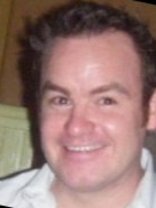 Person who looks like Tim Robbins