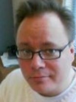 Person who looks like Elvis Costello