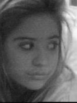 Person who looks like Mary-Kate and Ashley Olsen