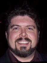 Person who looks like Tim Curry