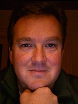 Person who looks like Drew Carey