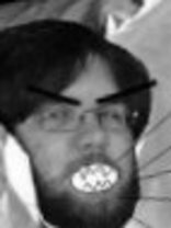 Person who looks like Tim Curry