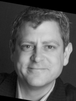 Person who looks like Greg Kinnear