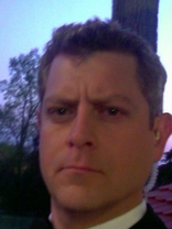 Person who looks like Greg Kinnear