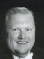 Person who looks like Drew Carey