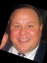 Person who looks like Drew Carey