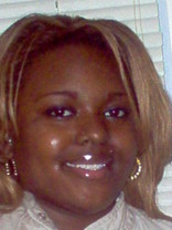 Person who looks like Lil' Kim