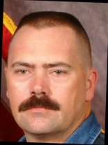 Person who looks like Greg Kinnear