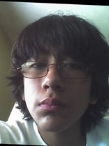 Person who looks like John Lennon