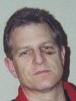 Person who looks like Harry Hamlin